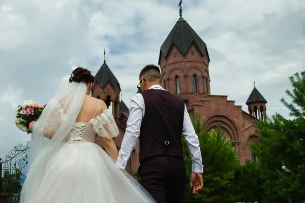 a bride and groom walking toward a church from CHURCH IN DALLAS in Dallas, TX - church near me